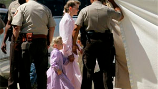 Polygamist Sect Raided On Charges Of Abuse Of Girls